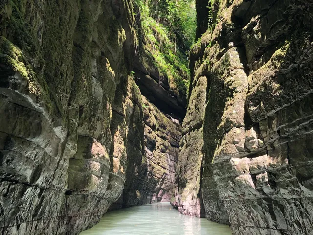 A river winding between forested hills in Bandarban